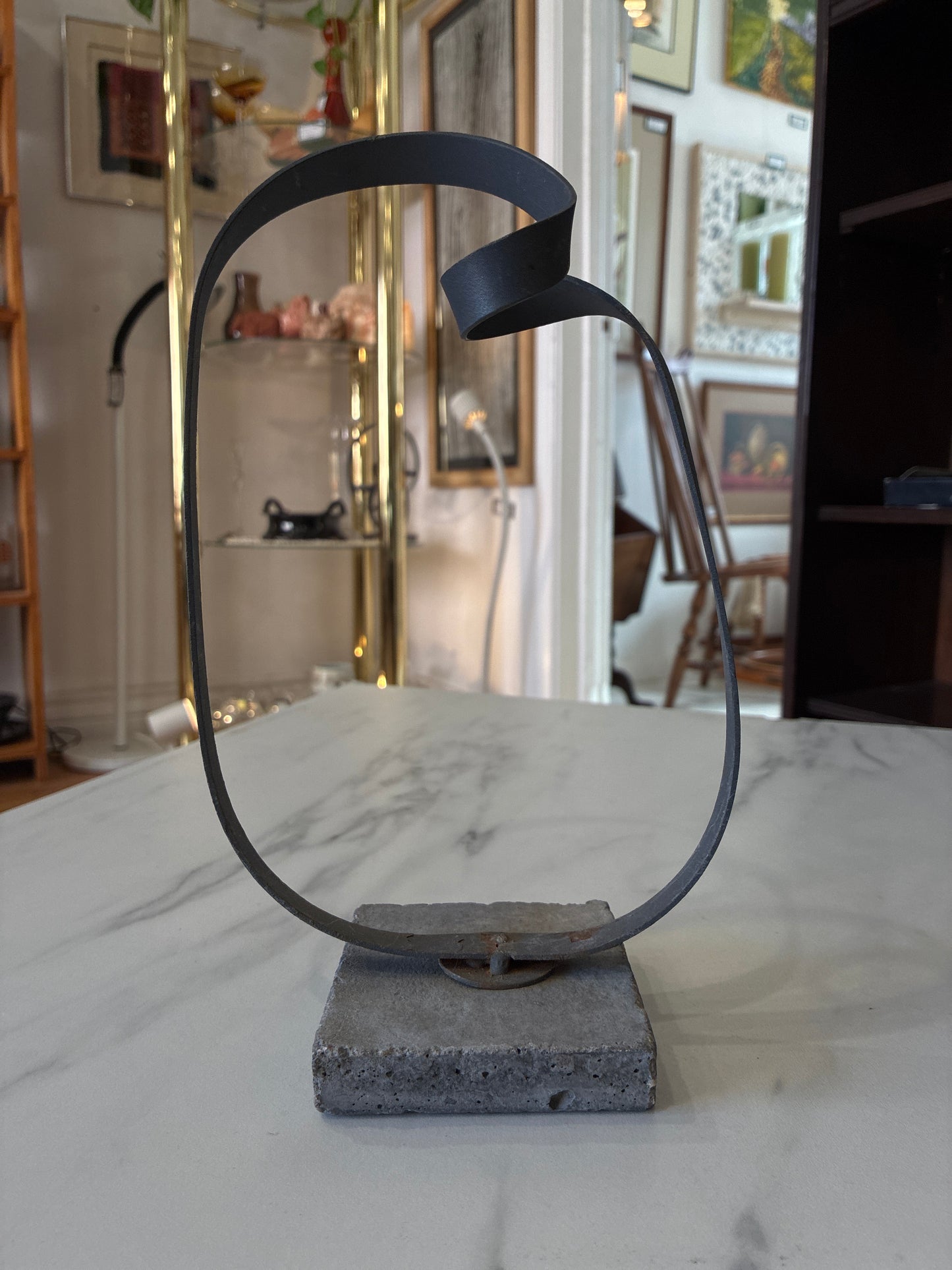 Minimalist Metal Loop Sculpture on Concrete Base