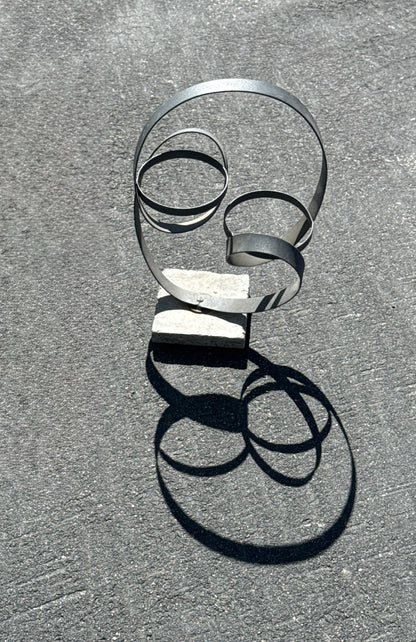 Minimalist Metal Sculpture Dual Loop on Concrete Base