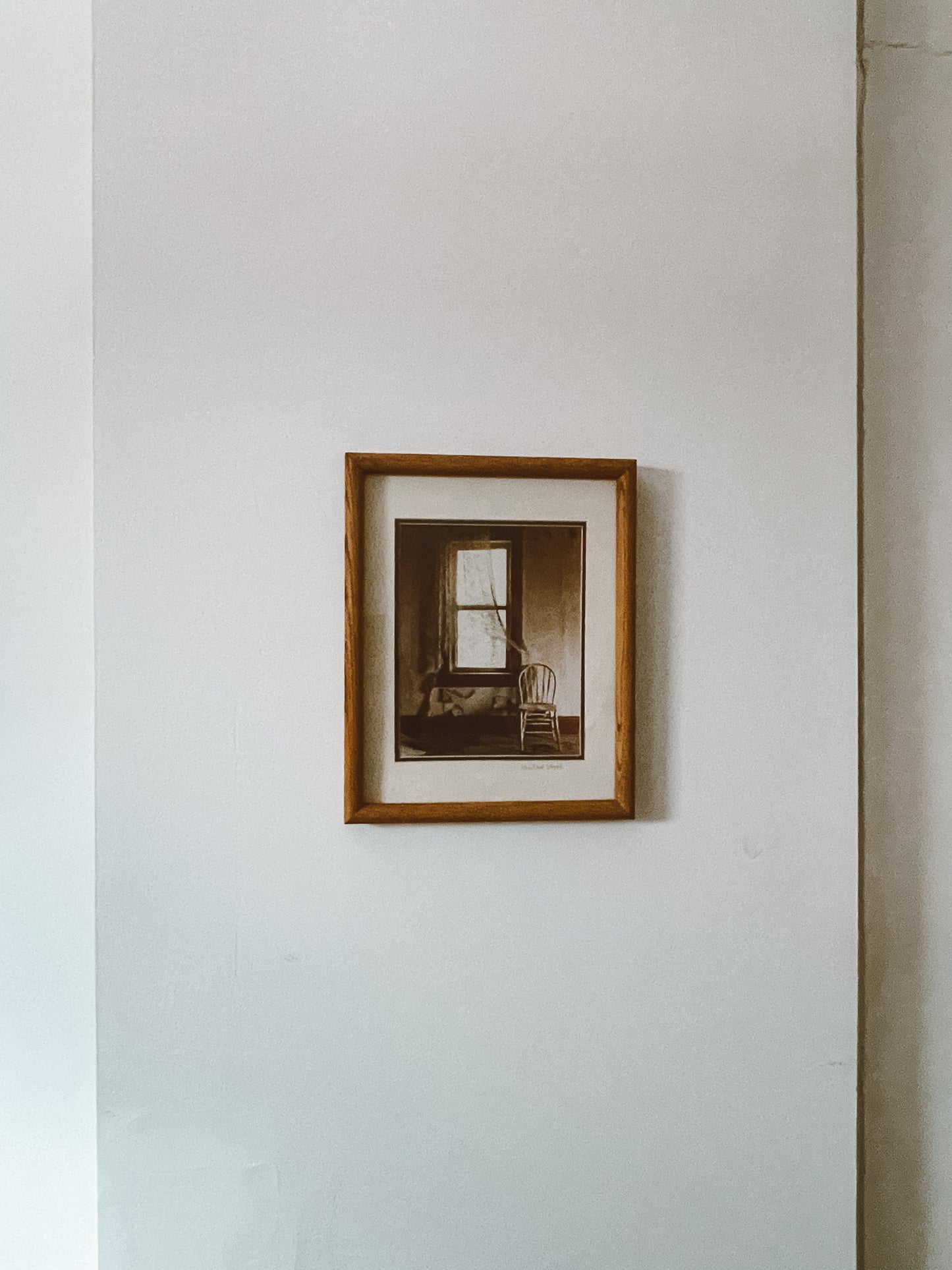 Framed Chair and Window Photo by Michael Stipele