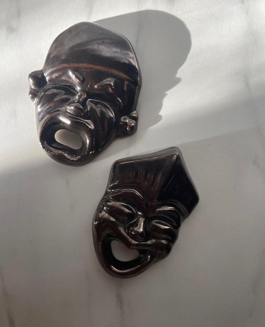Pair of Sculpted Ceramic Joker Theater Masks